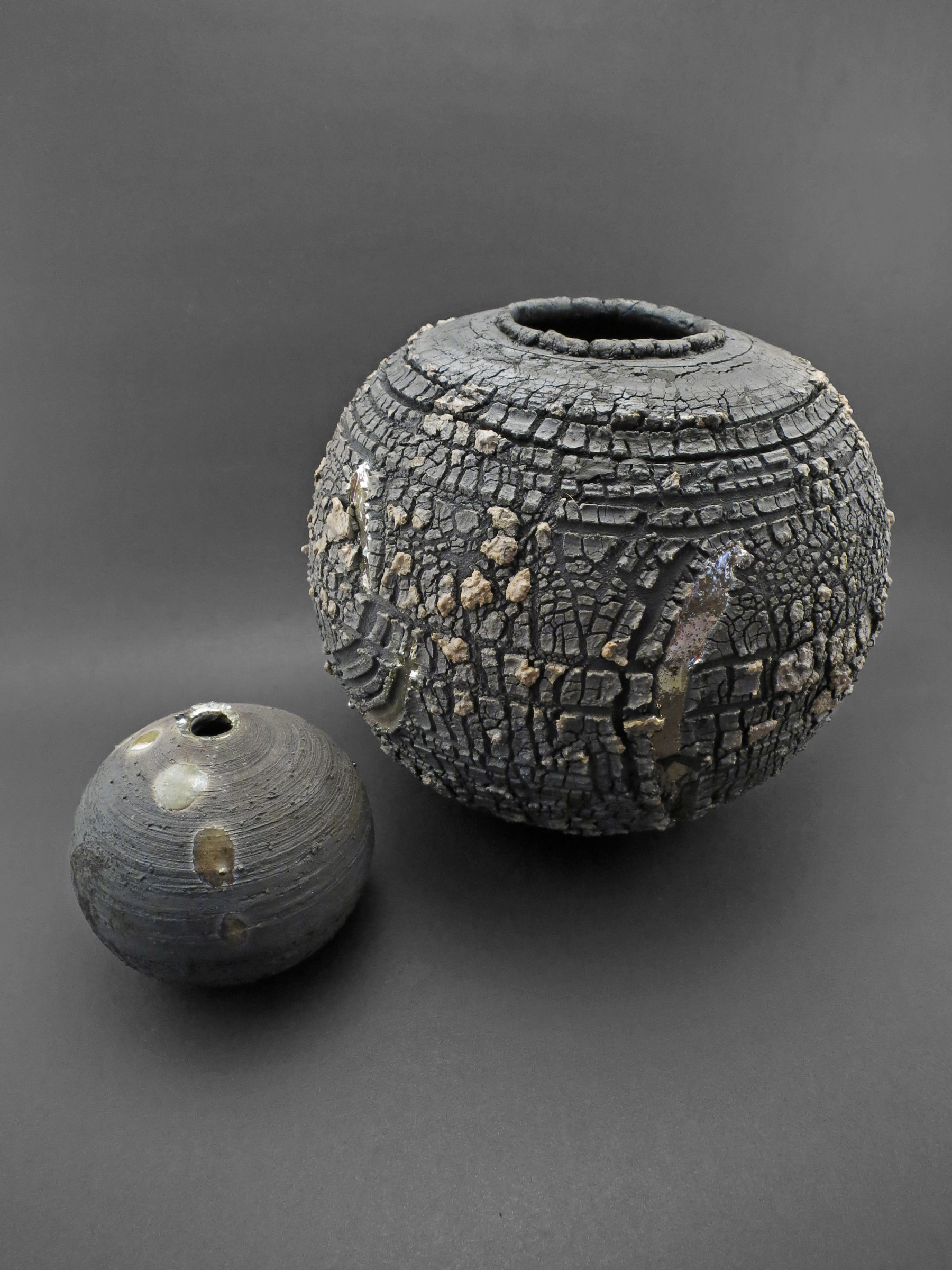 Dwarf Moon with Dwarf Planet: Whispering Globes - Ildikó Károlyi
