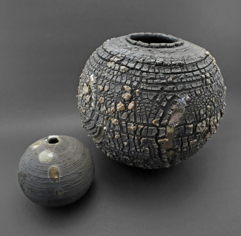 Dwarf Moon with Dwarf Planet: Whispering Globes - Ildikó Károlyi